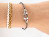 Bracelet bracelet FRED force 10 mm or blanc 18k + cable acier anthracite 58 Facettes 254692
