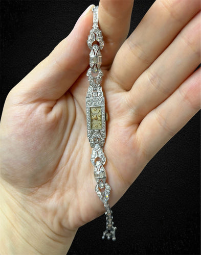 Montre Montre Art déco en or blanc 18 carats et diamants 58 Facettes