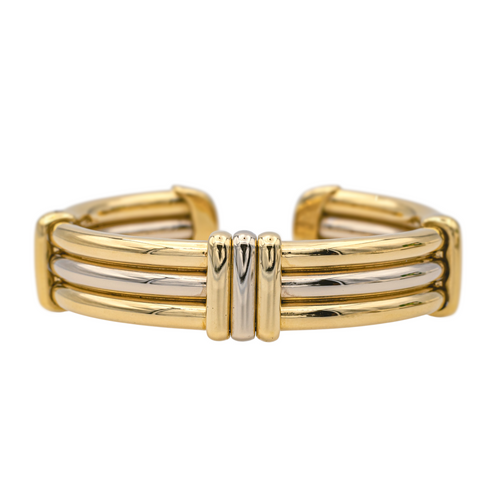 Bracelet O.J. Perrin - Bracelet rigide bicolore en or jaune et blanc 58 Facettes 1050174CN
