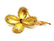 Broche Broche fleur vintage en or jaune 18 carats rubis et diamants 58 Facettes 1089906CD