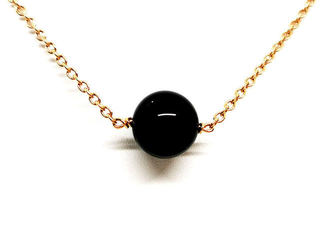 Collier Collier pendentif en or rose 18 carats et onyx 58 Facettes 1126007CN