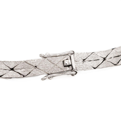 Bracelet Bracelet vintage motif feuillage en or blanc 18 carats, diamants et perles 58 Facettes 1142143CN