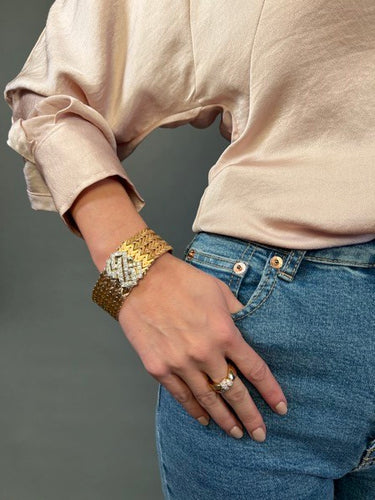 Bracelet Bracelet manchette en or jaune 18 carats et or blanc, diamants 58 Facettes 1165771CN