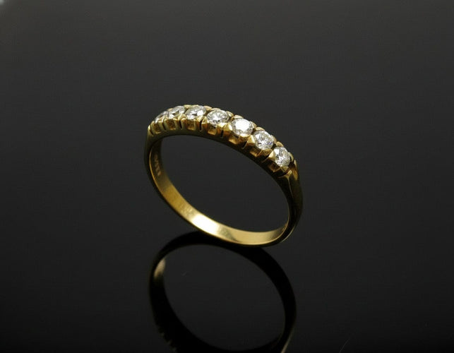 Bague Bague rivière années 1960 en or jaune 18 carats et diamants 58 Facettes