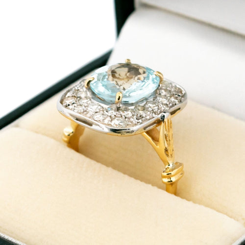 Bague 54.5 Bague entourage en or 18 carats avec aigue-marine et diamants 58 Facettes 3A835F118F3E4E7EA32FBF94D769BE53