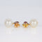 Boucles d'oreilles Boucles d'oreilles - Perles des mers du Sud, grenats et diamants en or jaune 58 Facettes E007