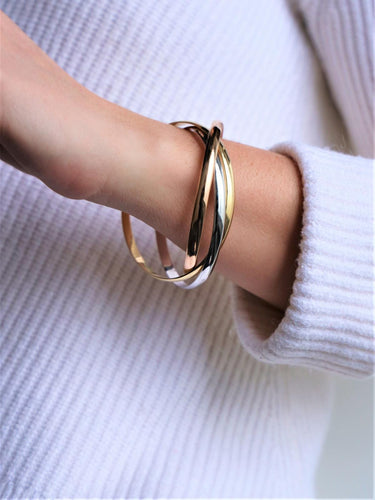 Bracelet Bracelet trois ors en or blanc, or jaune et or rose 18 carats 58 Facettes 2201733CN