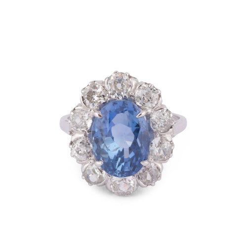 Bague 57 Bague entourage saphir de Ceylan ovale en platine et diamants 58 Facettes 1