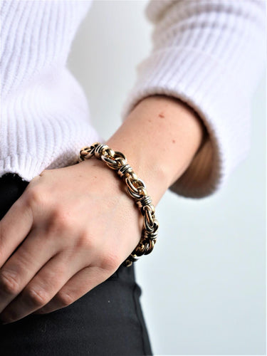 Bracelet Caplain Saint André - Bracelet en or jaune et blanc 18 carats avec saphir 58 Facettes 2282993CN