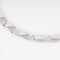 Collier Chaumet - Collier articulé en or gris 18k et diamants 58 Facettes 1