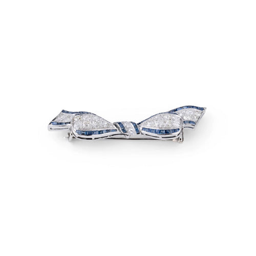 Broche Broche nœud Art déco en platine et diamants, saphirs calibrés 58 Facettes 1