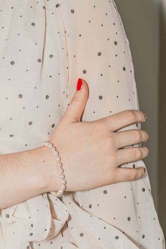 Bracelet Bracelet en or jaune 18 carats et perles de culture blanches 58 Facettes 2377022CN