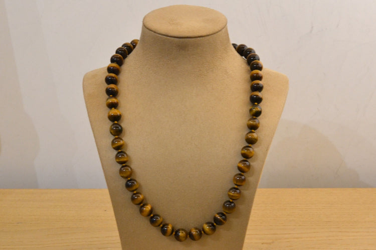 Collier Collier en or 18k et œil de tigre 58 Facettes 25046