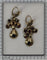Boucles d'oreilles Boucles d’oreilles ibériques baroques pendantes en or jaune 18K et grenats 58 Facettes 25115-0315