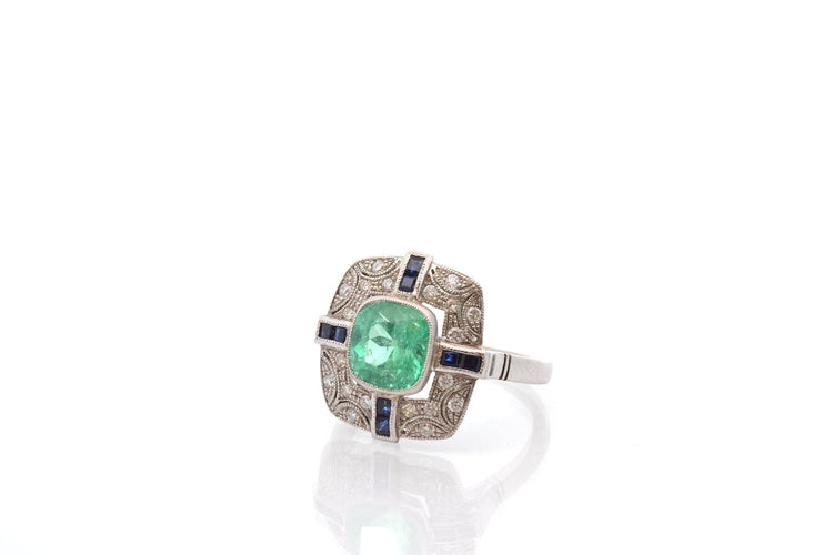 Bague 55 Bague Art déco en platine émeraude, diamants et saphirs 58 Facettes 27176