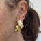Boucles d'oreilles Boucles d’oreilles pendantes ondulées en or jaune 18 ct 58 Facettes 30294