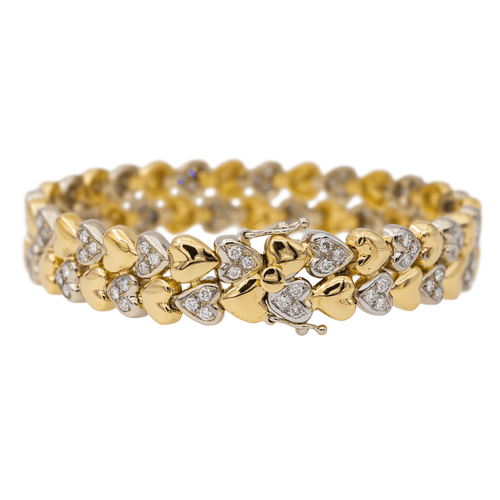 Bracelet Bracelet motifs cœur en or jaune et or blanc 18 carats et diamants 58 Facettes 3036216CN