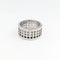 https://18carats.fr/wp-content/uploads/2024/12/31501-31731-Bague-Gucci-Large-Scroll-or-blanc-et-diamant-scaled.webp
