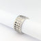 https://18carats.fr/wp-content/uploads/2024/12/31501-31733-Bague-Gucci-Large-Scroll-or-blanc-et-diamant-scaled.webp