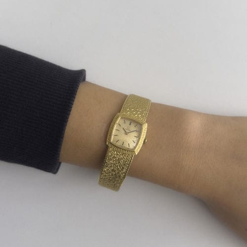 Montre Omega - Montre femme en or jaune 18 ct 58 Facettes 32185