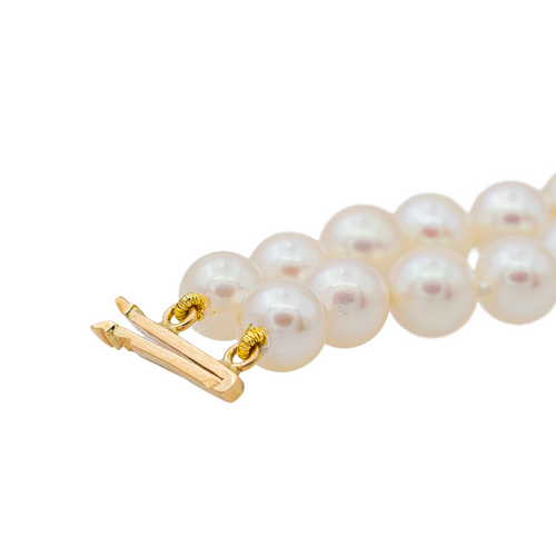 Bracelet Bracelet double rang de perles en or jaune 18 carats 58 Facettes 3282604CN