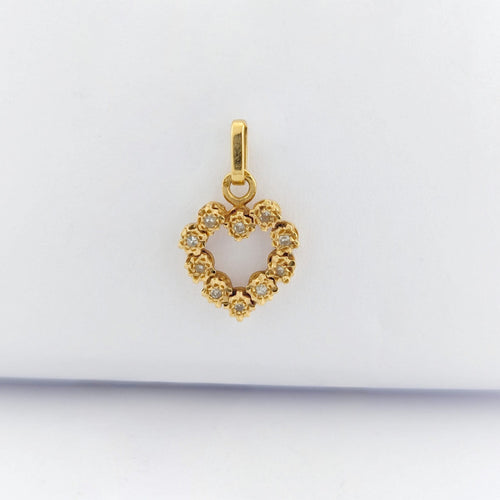 https://18carats.fr/wp-content/uploads/2025/10/33147-33148-Pendentif-coeur-en-or-jaune-et-diamants-scaled.jpg