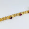 Bracelet Bracelet en or jaune 18 carats avec diamants et rubis 58 Facettes 33374