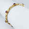 Bracelet Bracelet en or jaune 18 carats avec diamants et rubis 58 Facettes 33374