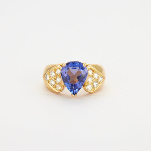 Bague 54 Bague en Or jaune, diamants, tanzanite 58 Facettes