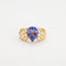 Bague 54 Bague en Or jaune, diamants, tanzanite 58 Facettes