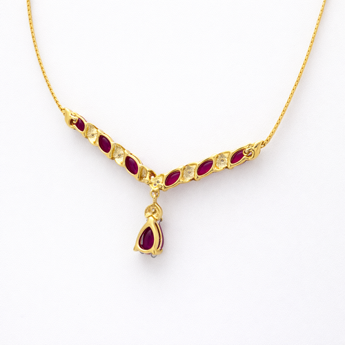 https://18carats.fr/wp-content/uploads/2026/01/34623-34668-Collier-en-or-jaune-diamants-et-rubis.png