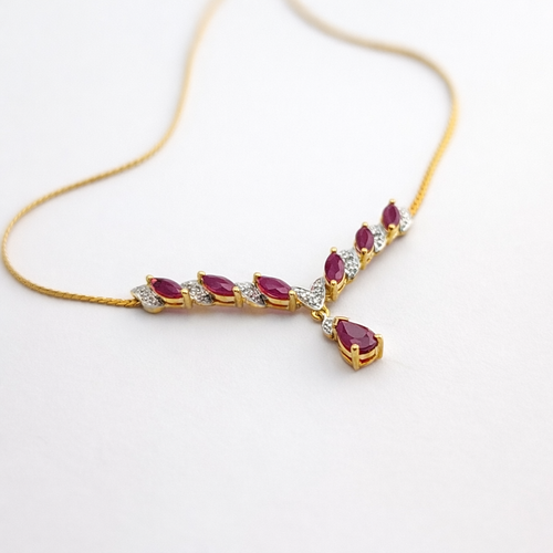 https://18carats.fr/wp-content/uploads/2026/01/34623-34669-Collier-en-or-jaune-diamants-et-rubis.png