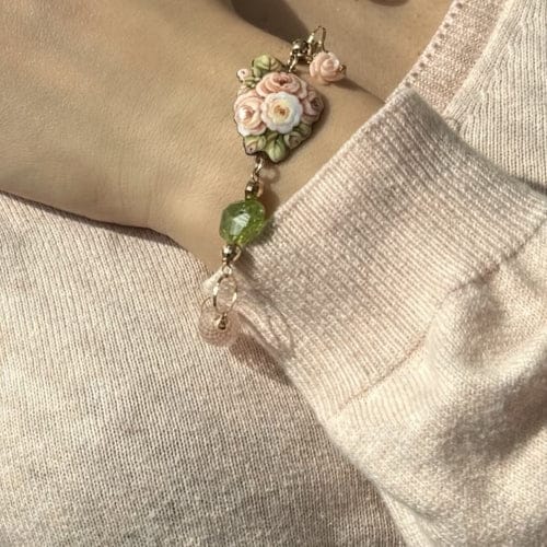 Bracelet Gabriella Rivalta - Bracelet fleur émaillée en or jaune 18 ct 58 Facettes 36316