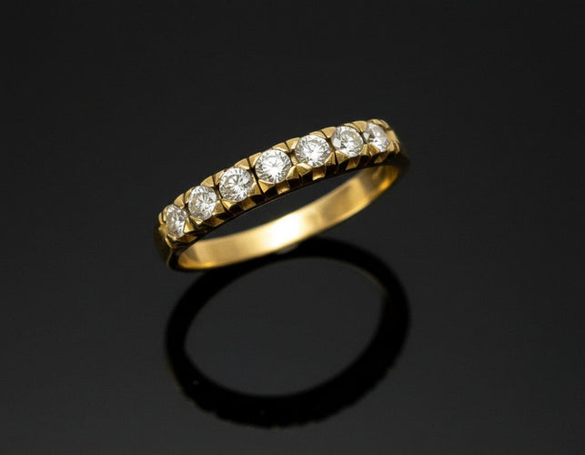 Bague Bague rivière années 1960 en or jaune 18 carats et diamants 58 Facettes