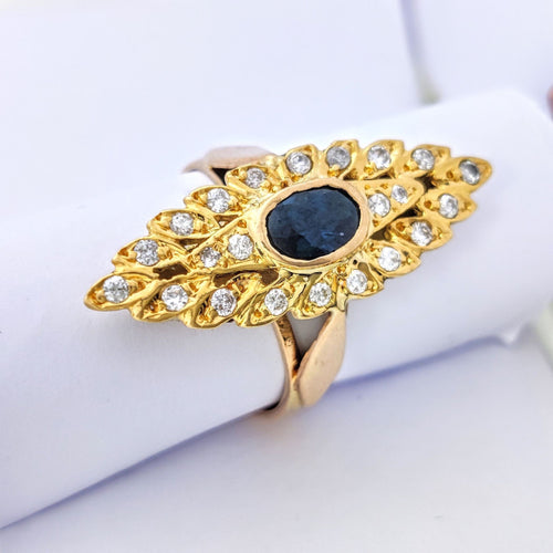 Bague 53 Bague marquise en or jaune 18 carats, saphir et diamants 58 Facettes 5611