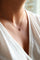Collier Collier graphique rectangle en or blanc et or rose avec diamants 58 Facettes 579199RV