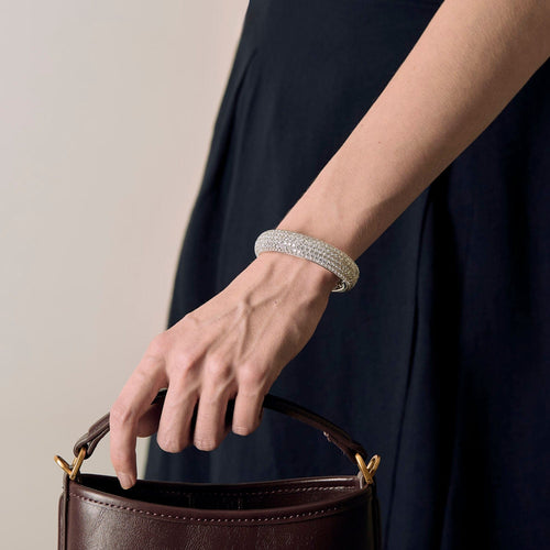 CARTIER - Exceptionnel bracelet jonc en platine et diamants 58 Facettes