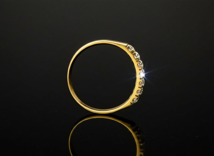 Bague Bague rivière années 1960 en or jaune 18 carats et diamants 58 Facettes