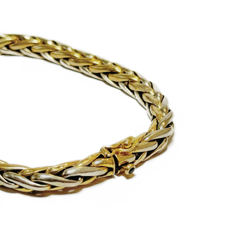 Bracelet Bracelet souple à maille épi en or jaune 18K et or gris 58 Facettes REF24058-221