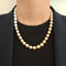 Necklace Golden and white pearl necklace in 18-carat yellow gold 58 Facettes