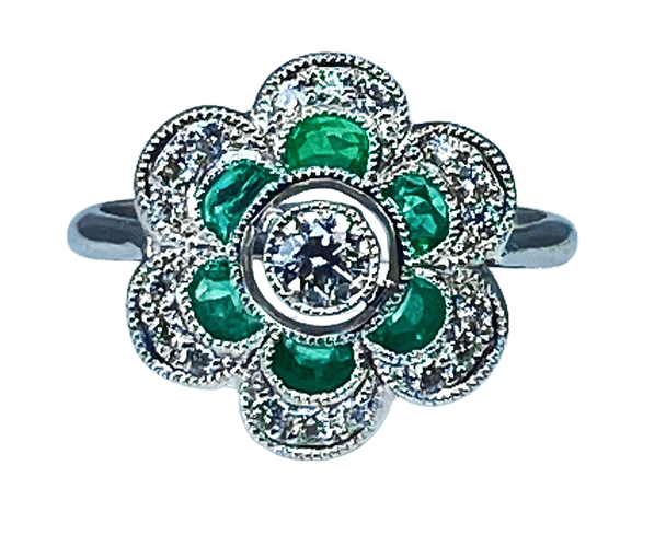 Bague 54 Bague or blanc, émeraudes, diamants 58 Facettes AB379