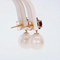 Boucles d'oreilles Boucles d'oreilles - Perles des mers du Sud, grenats et diamants en or jaune 58 Facettes E007