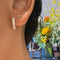 Boucles d'oreilles Boucles d'oreilles créoles en or jaune 18 carats et diamants 58 Facettes E4E86611FC5241C388E2BC3F779A76D0