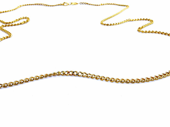 Collier Collier chaîne maille gourmette en or jaune 18 carats 58 Facettes 948044CD