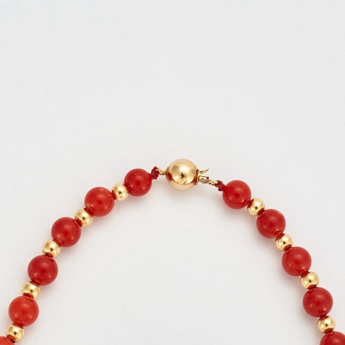 Collier Collier or jaune billes de corail 58 Facettes DV0362-3