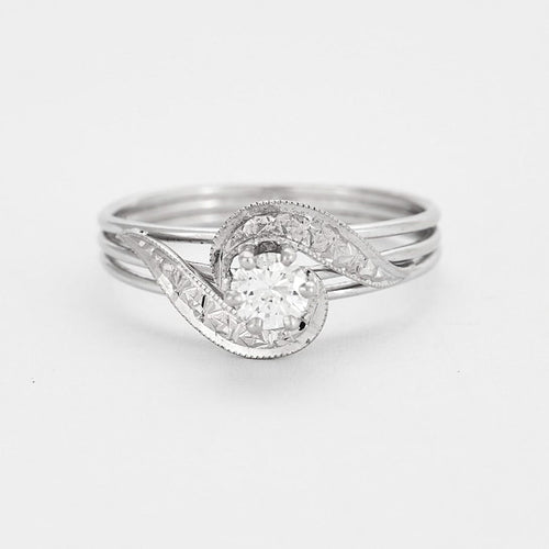 Bague 60 Bague "Tourbillon" en or gris et diamant 58 Facettes DV0541-3