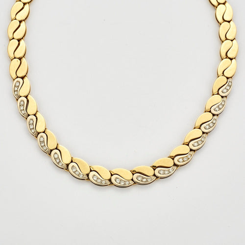 Collier Collier en or jaune et or gris serti de diamants 58 Facettes DV0551-2