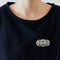 Broche Broche Art Déco - platine et or gris 58 Facettes DV0602-1