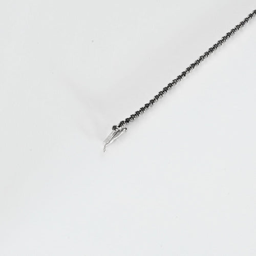 Bracelet Bracelet ligne en or gris et diamants noirs facettés 58 Facettes DV3020-4