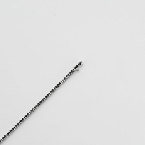 Bracelet Bracelet ligne en or gris et diamants noirs facettés 58 Facettes DV3020-4